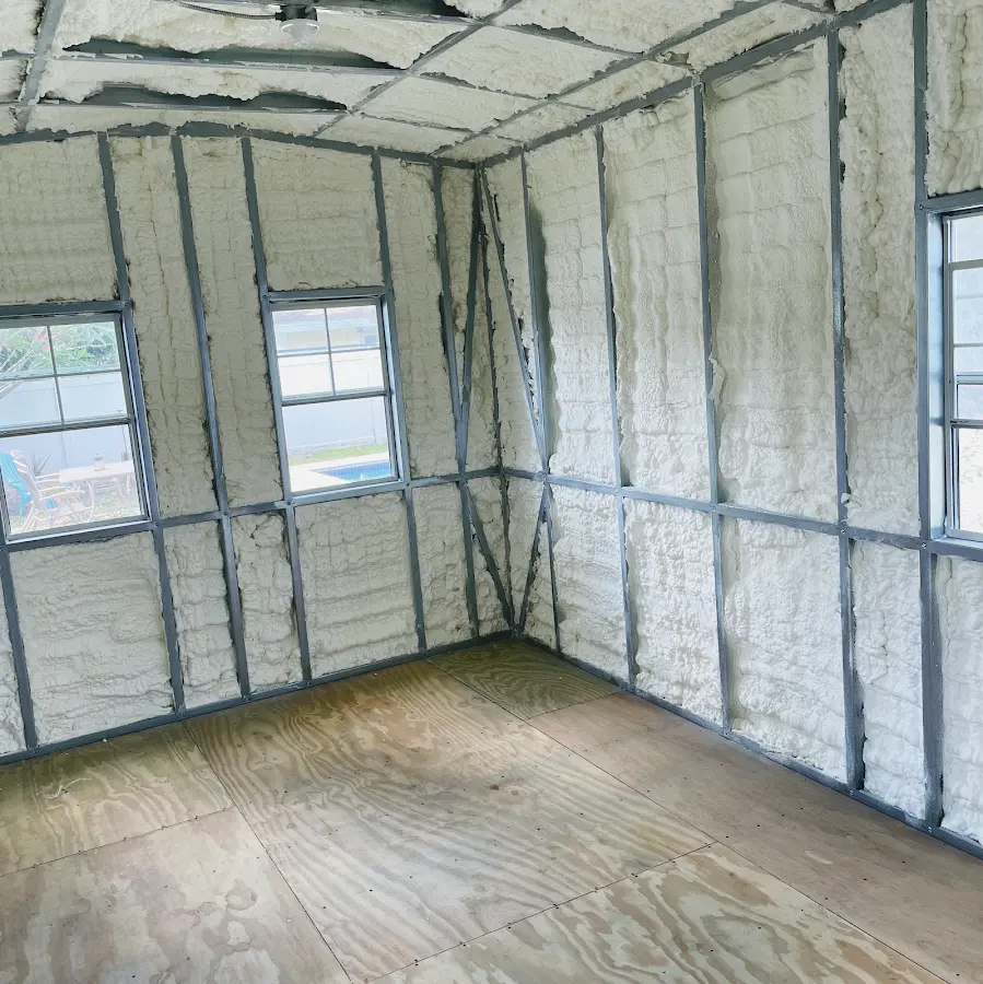 Closed-cell spray foam insulation applied to wall cavities in a residential project in Rosamond